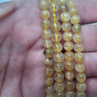 Rutilquarz gold AB+ Armband rund 6mm